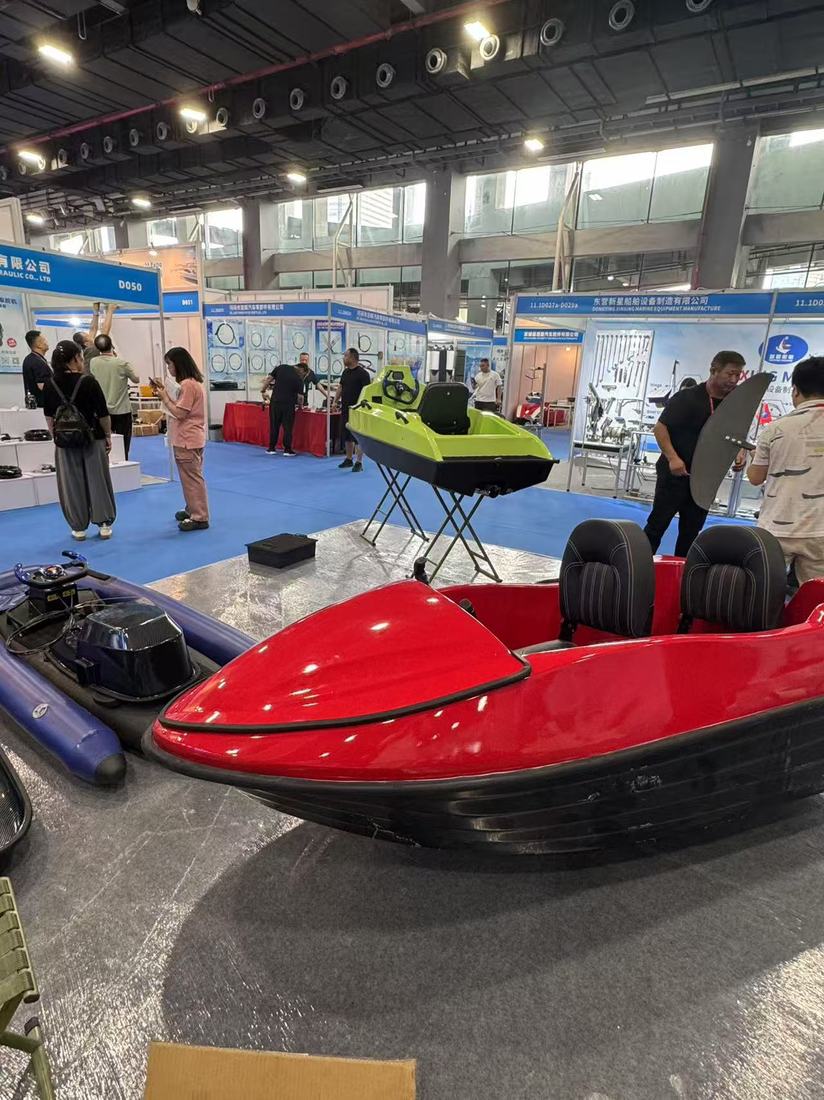 AquaVolt jet boats on display at an industry event